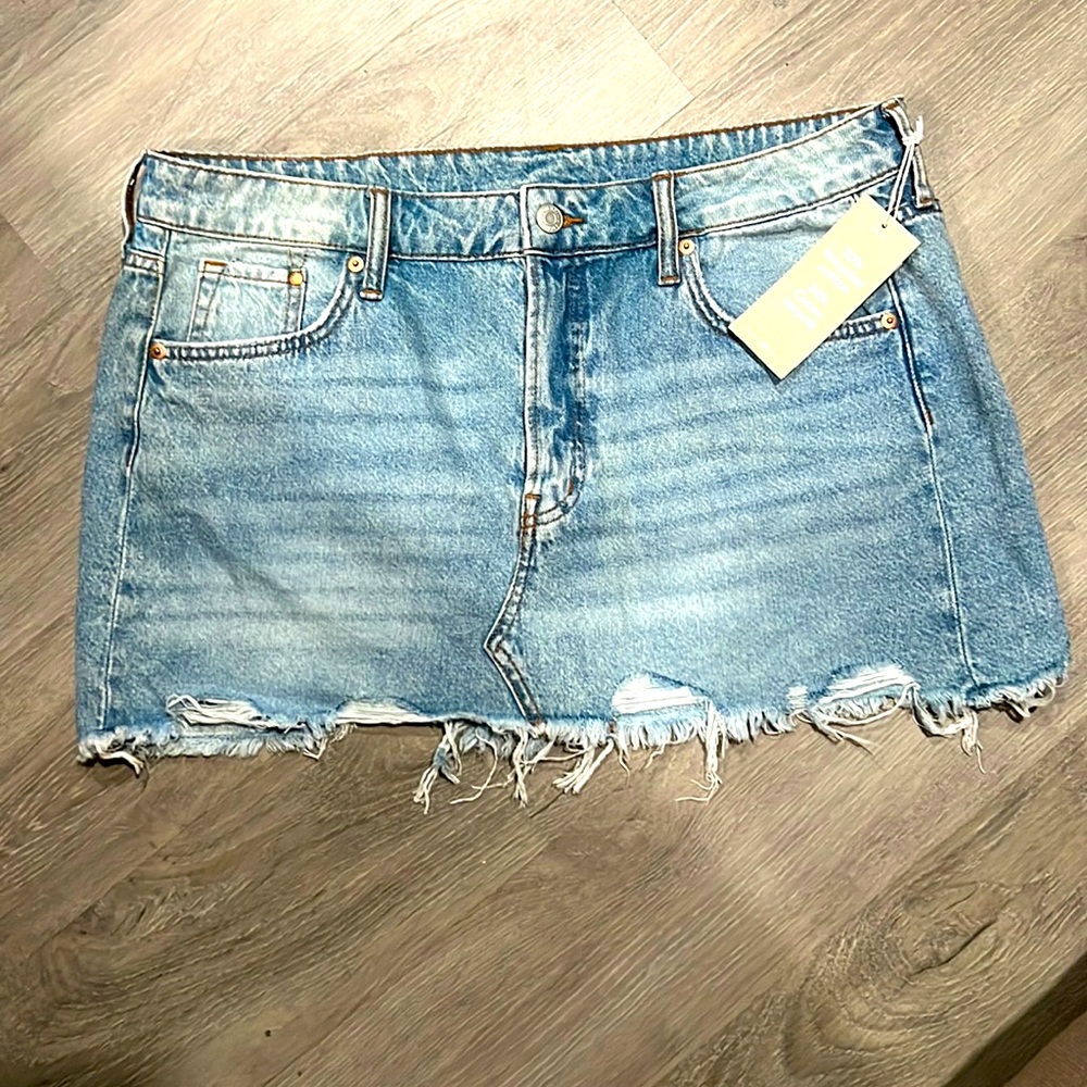 Light blue, distressed, mini skirt